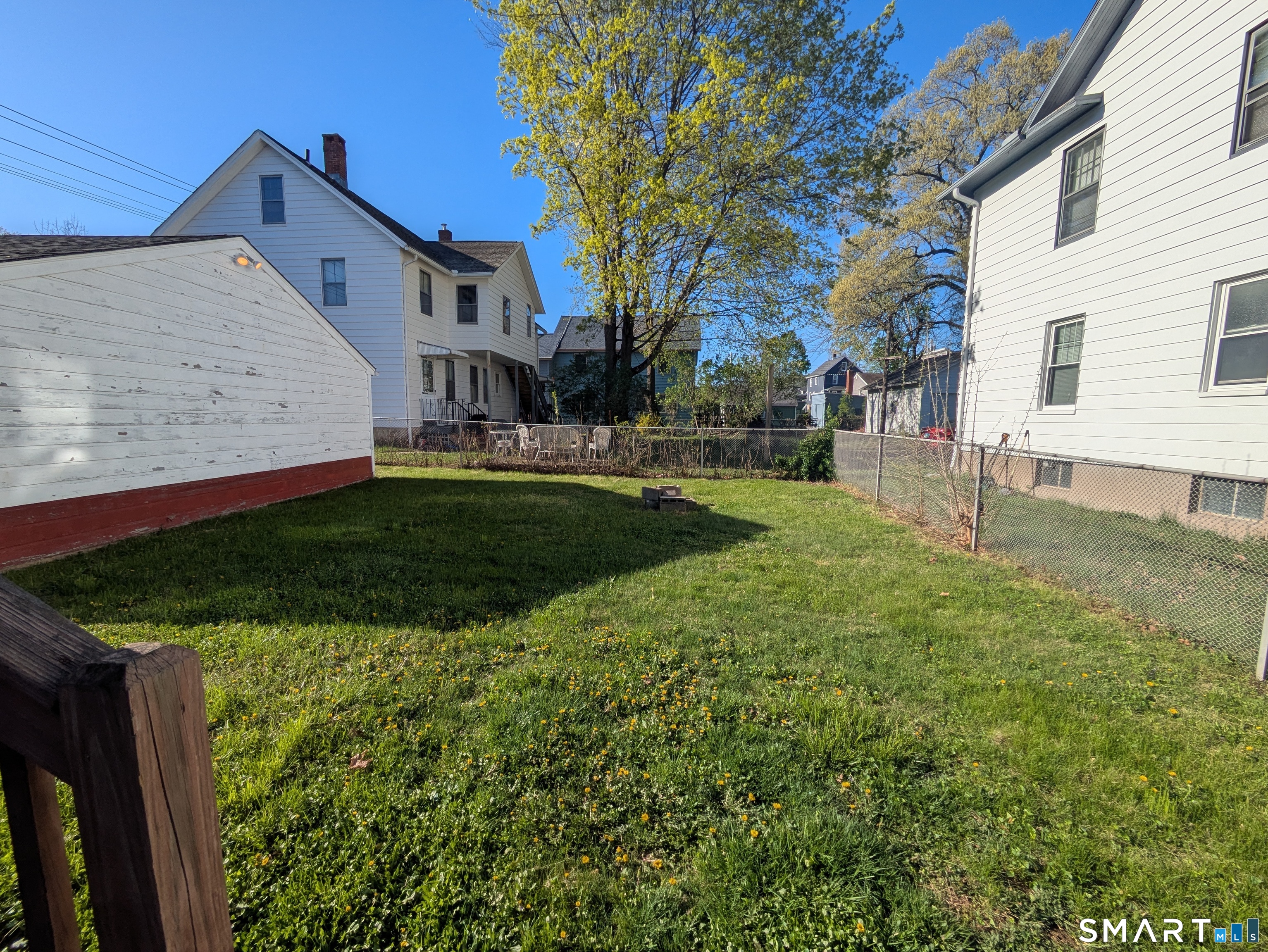 232 Hawkins Street Derby, CT 06418 - Photo 11 of 27 a view of a back yard of the house
