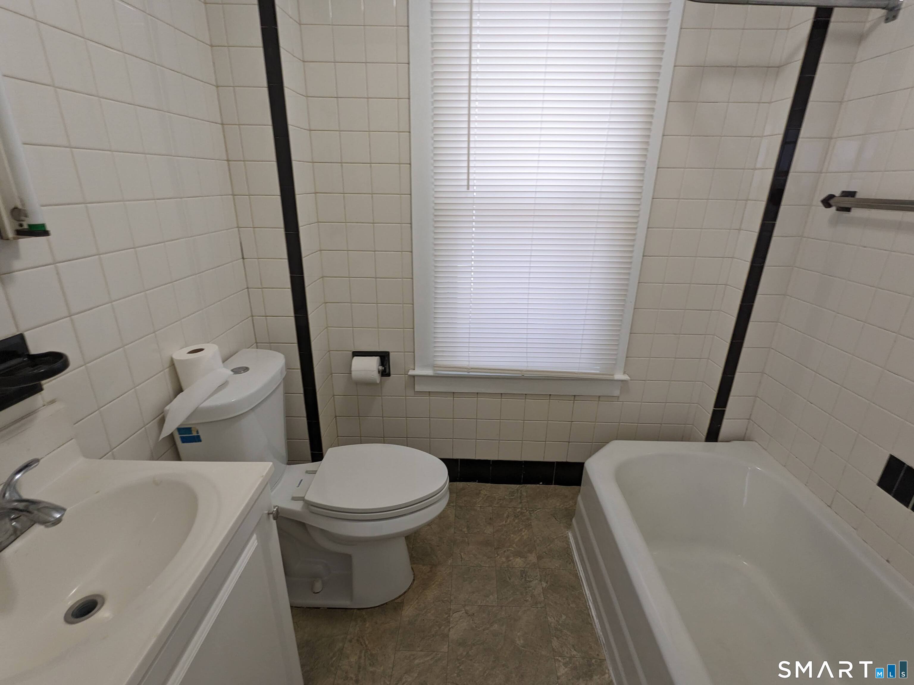 232 Hawkins Street Derby, CT 06418 - Photo 22 of 27 a bathroom with a sink and a toilet