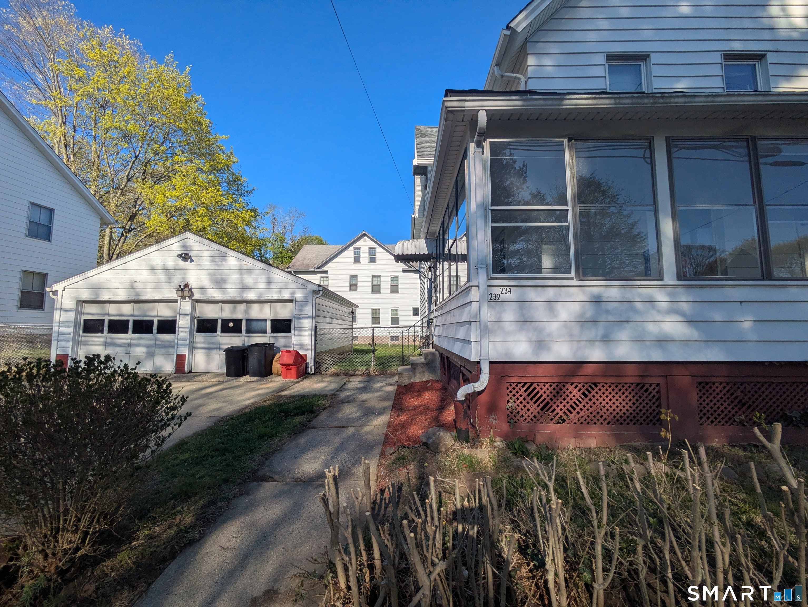 232 Hawkins Street Derby, CT 06418 - Photo 5 of 27 a view of a house with wooden fence