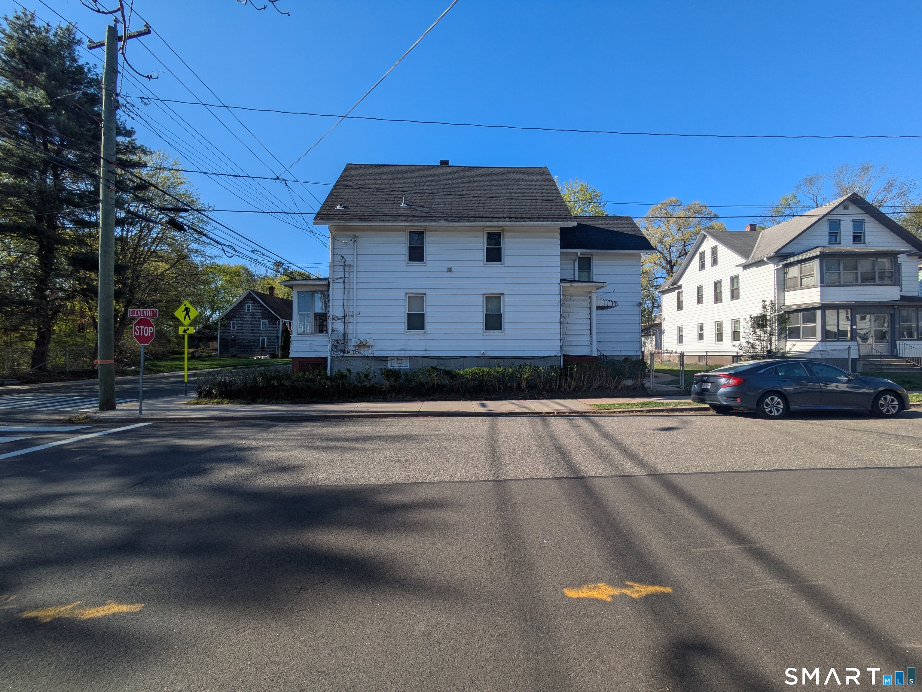 232 Hawkins Street Derby, CT 06418 - Photo 7 of 27 a front view of a building with a road
