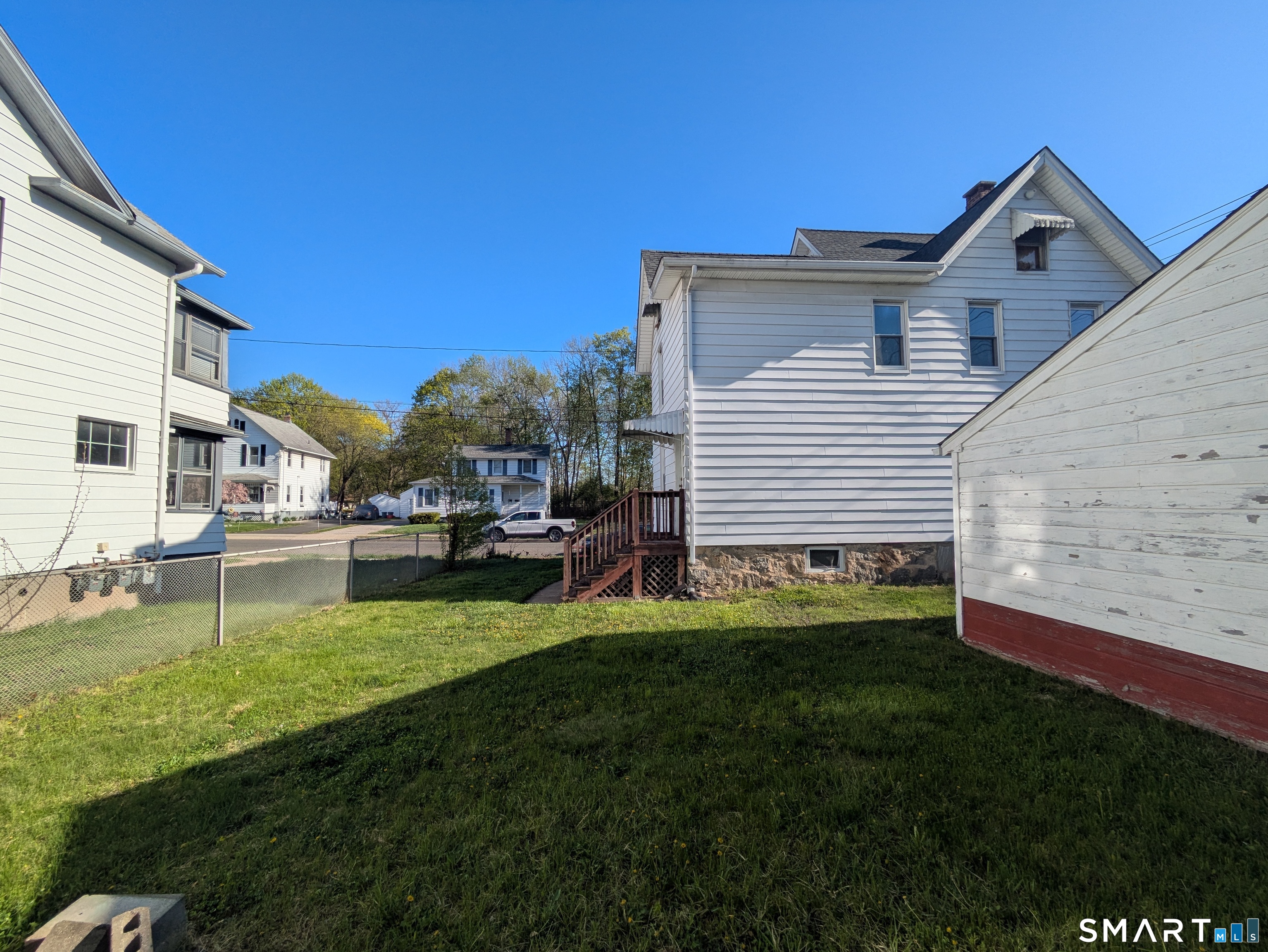 232 Hawkins Street Derby, CT 06418 - Photo 9 of 27 a view of a house with a yard