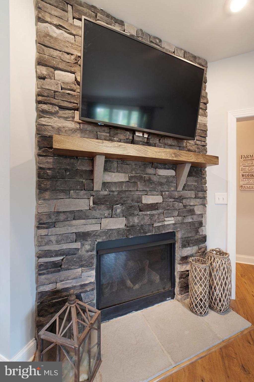 12204 Old Stillhouse Road Boston, VA 22713 - Photo 16 of 39 fireplace with stone surround
