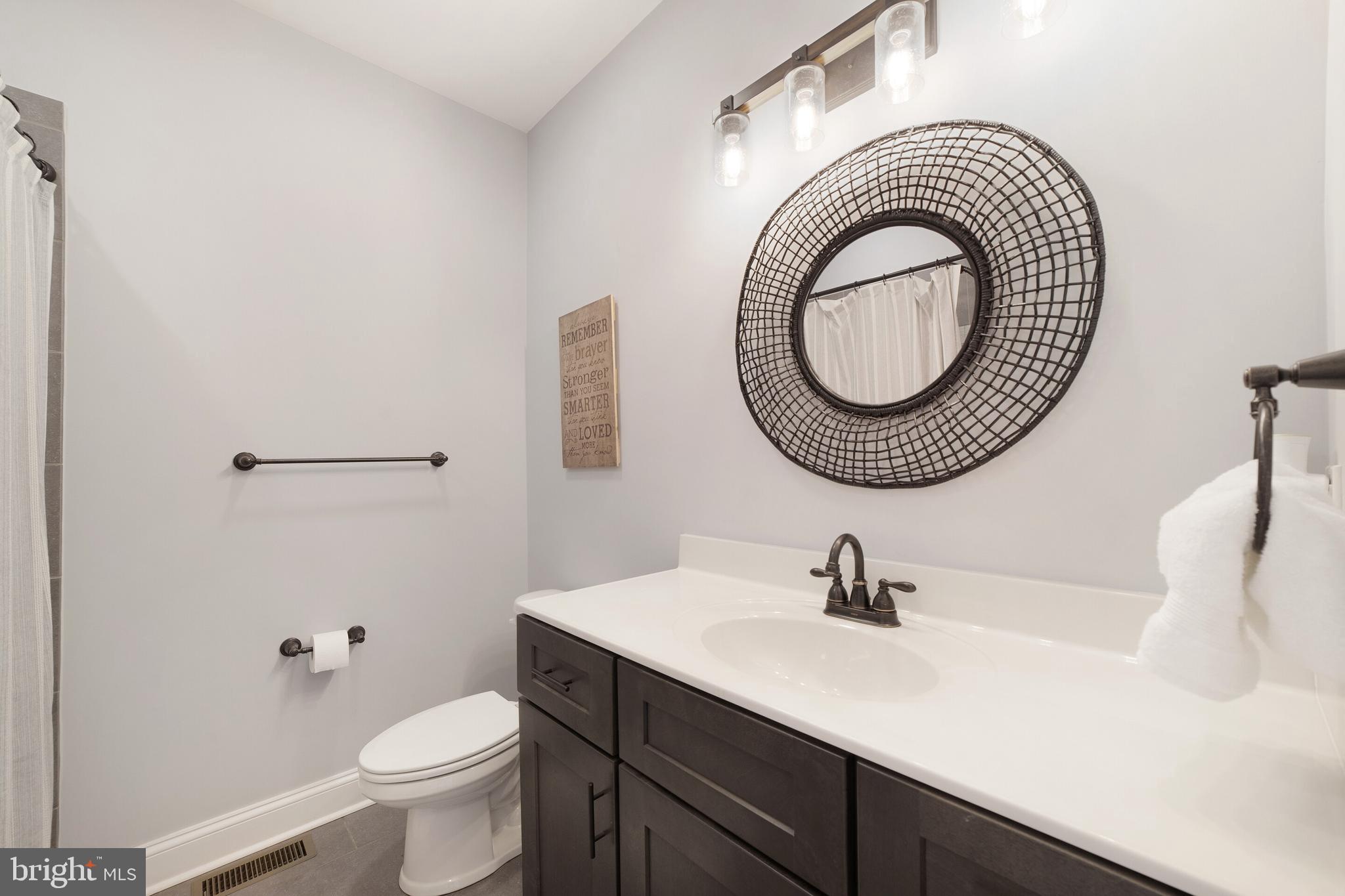 12204 Old Stillhouse Road Boston, VA 22713 - Photo 22 of 39 Hall bath with taller vanities