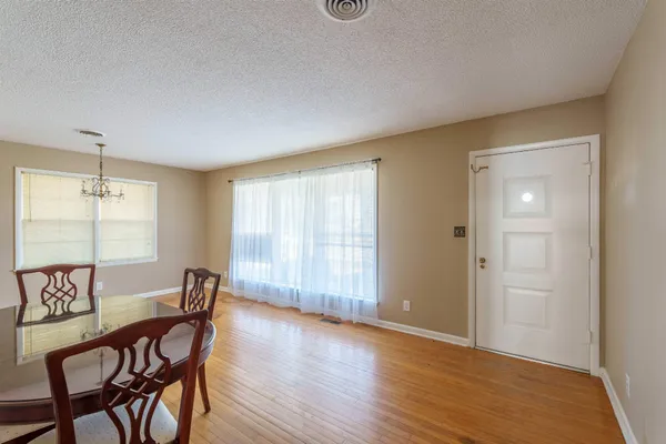 a view of a livingroom with furniture and window