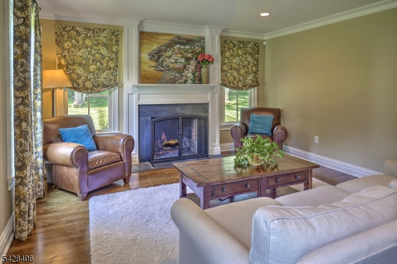 40 Sunnybrook Road Bernards, NJ 07920 - Photo 11 of 30 a living room with furniture and a fireplace