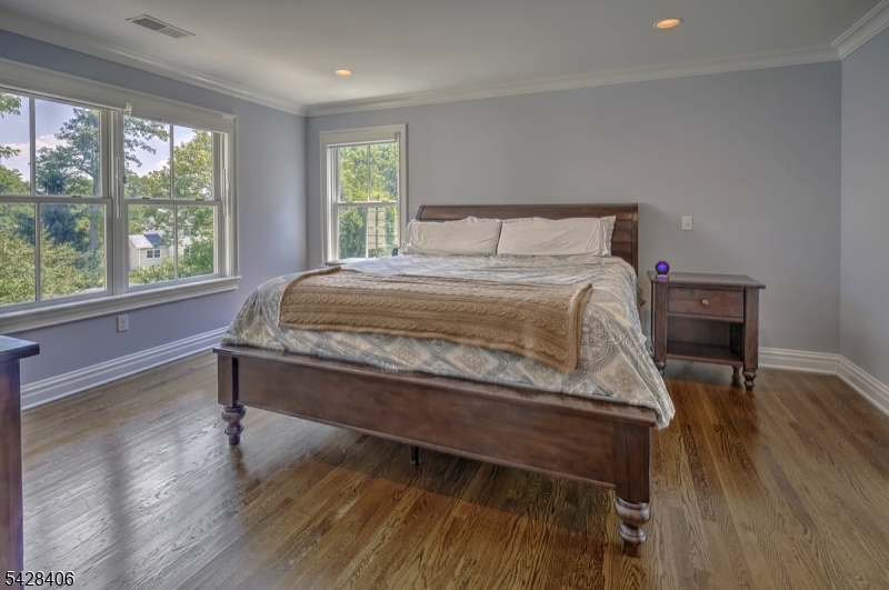 40 Sunnybrook Road Bernards, NJ 07920 - Photo 16 of 30 a bedroom with a bed and a table