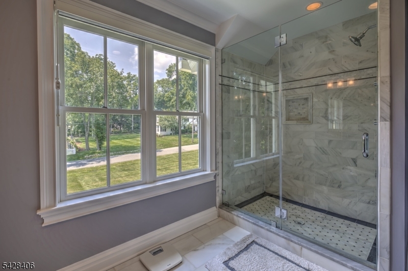 40 Sunnybrook Road Bernards, NJ 07920 - Photo 19 of 30 a bathroom with a shower and window