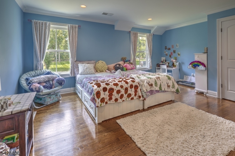 40 Sunnybrook Road Bernards, NJ 07920 - Photo 21 of 30 a bed room with a bed and a couch