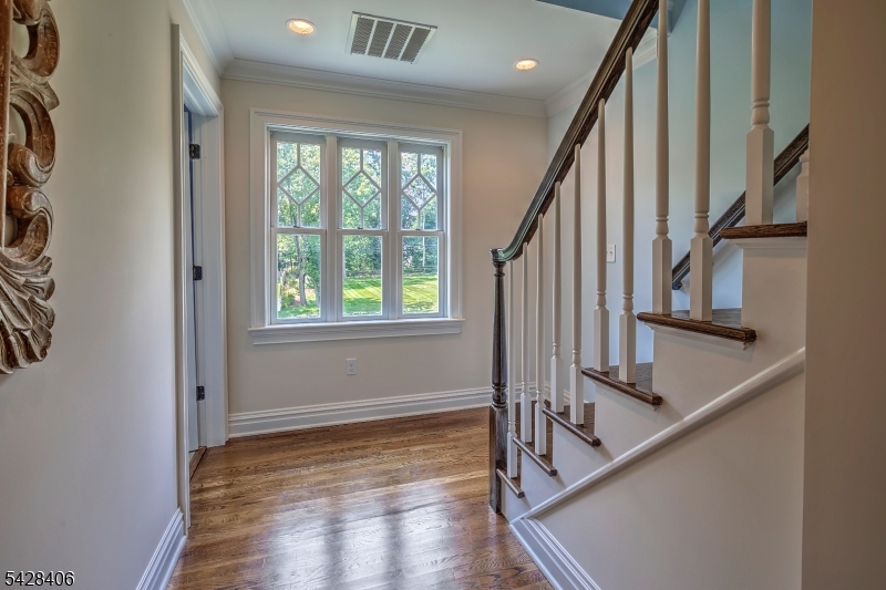40 Sunnybrook Road Bernards, NJ 07920 - Photo 24 of 30 a view of an entryway with wooden floor and door