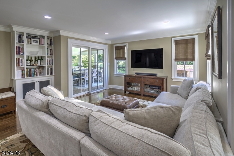 40 Sunnybrook Road Bernards, NJ 07920 - Photo 5 of 30 a living room with furniture and a flat screen tv