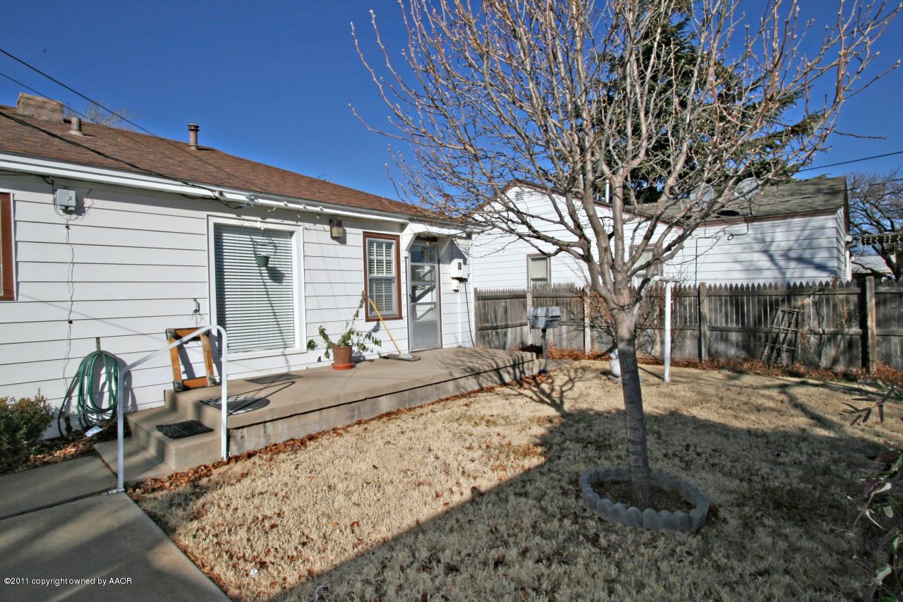927 South Rusk Street Amarillo, TX 79102 - Photo 11 of 13 a view of a house with a backyard