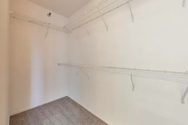 a view of a room with racks on the wall
