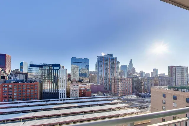 a view of a city with tall buildings