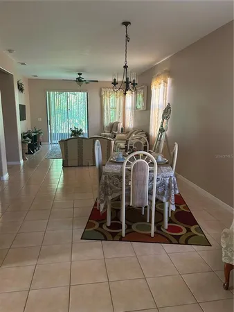 a view of a livingroom with furniture and window