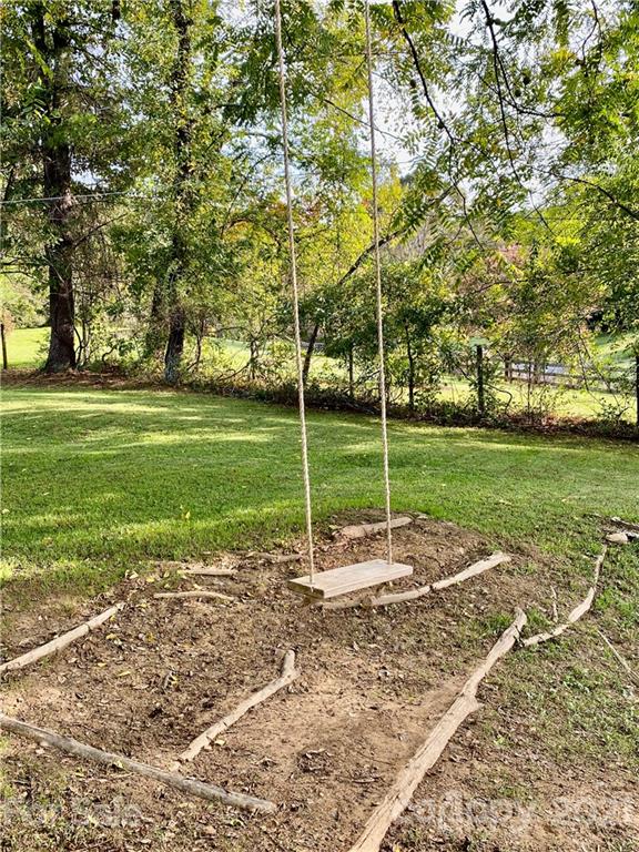 162 Upper Brush Creek Road Fletcher, NC 28732 - Photo 7 of 9 a view of a park with basketball court