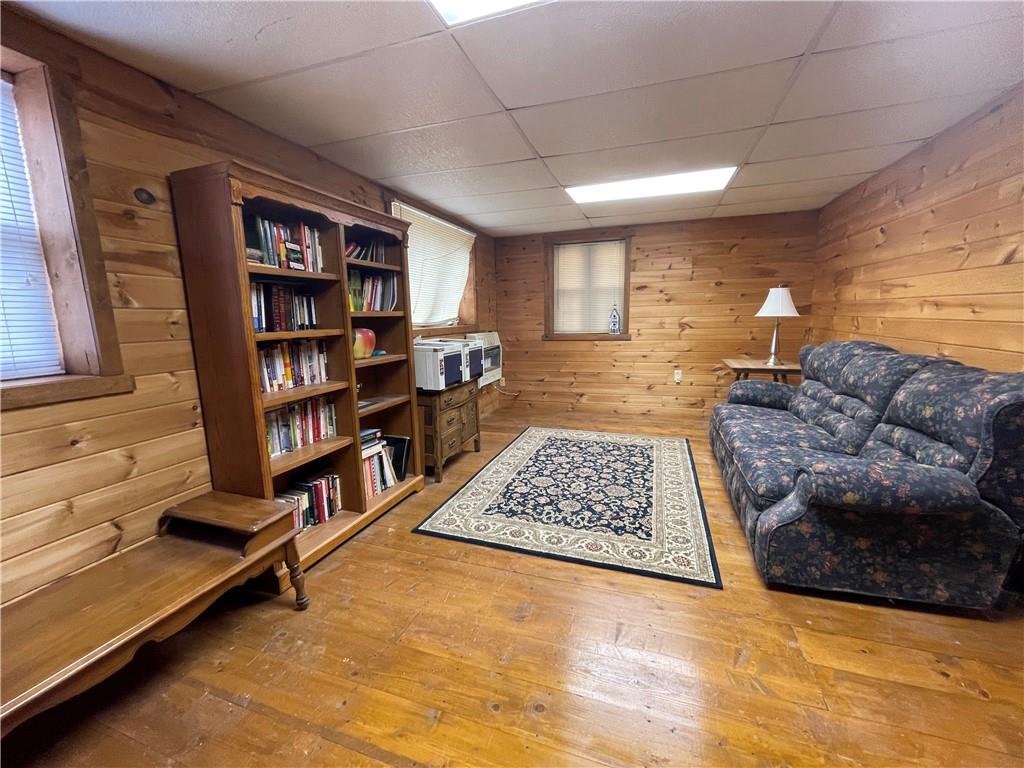 4 Lewis Road Shelocta, PA 15774 - Photo 16 of 18 a living room with furniture a rug and a book shelf