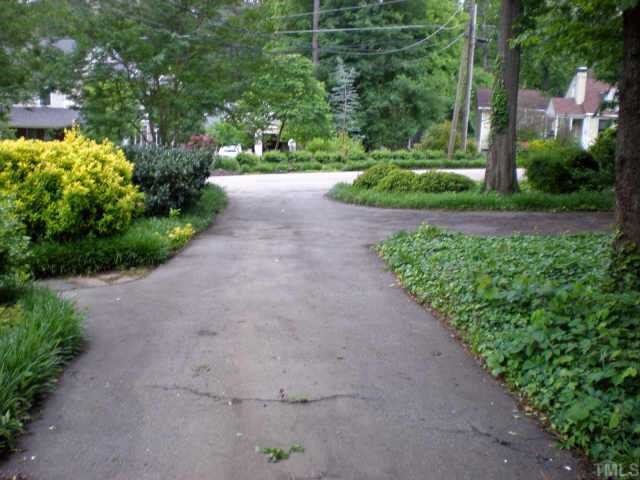 2711 Kittrell Drive Raleigh, NC 27608 - Photo 5 of 11 a view of a garden with pathway