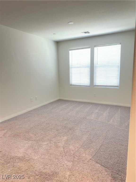 2444 Padulle Place Henderson, NV 89044 - Photo 6 of 11 Unfurnished room with baseboards, carpet flooring,