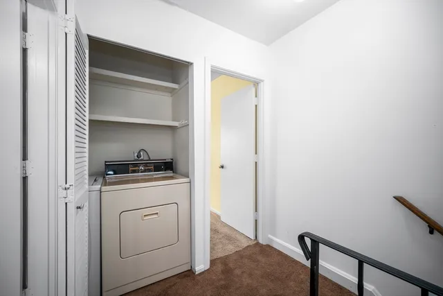 a view of outdoor space with wooden fence