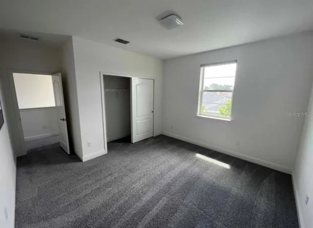 an empty room with windows