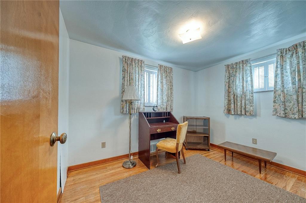 21 Spring Street Etna, PA 15223 - Photo 13 of 27 a room with furniture and windows