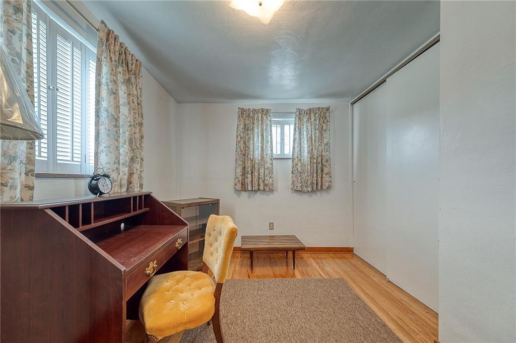 21 Spring Street Etna, PA 15223 - Photo 14 of 27 a bathroom with a sink and a mirror