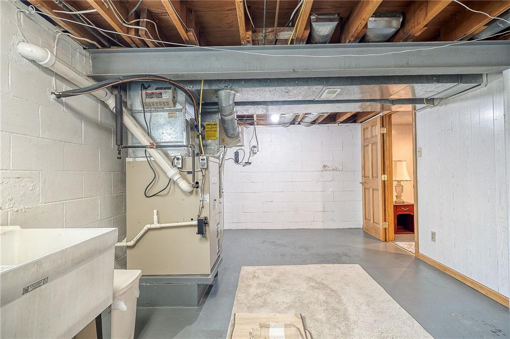21 Spring Street Etna, PA 15223 - Photo 20 of 27 a bathroom with a bathtub and shower