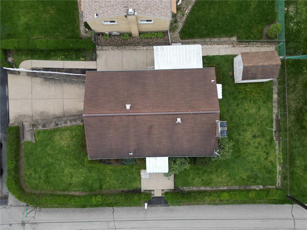 21 Spring Street Etna, PA 15223 - Photo 2 of 27 an aerial view of a house with a yard and potted plants