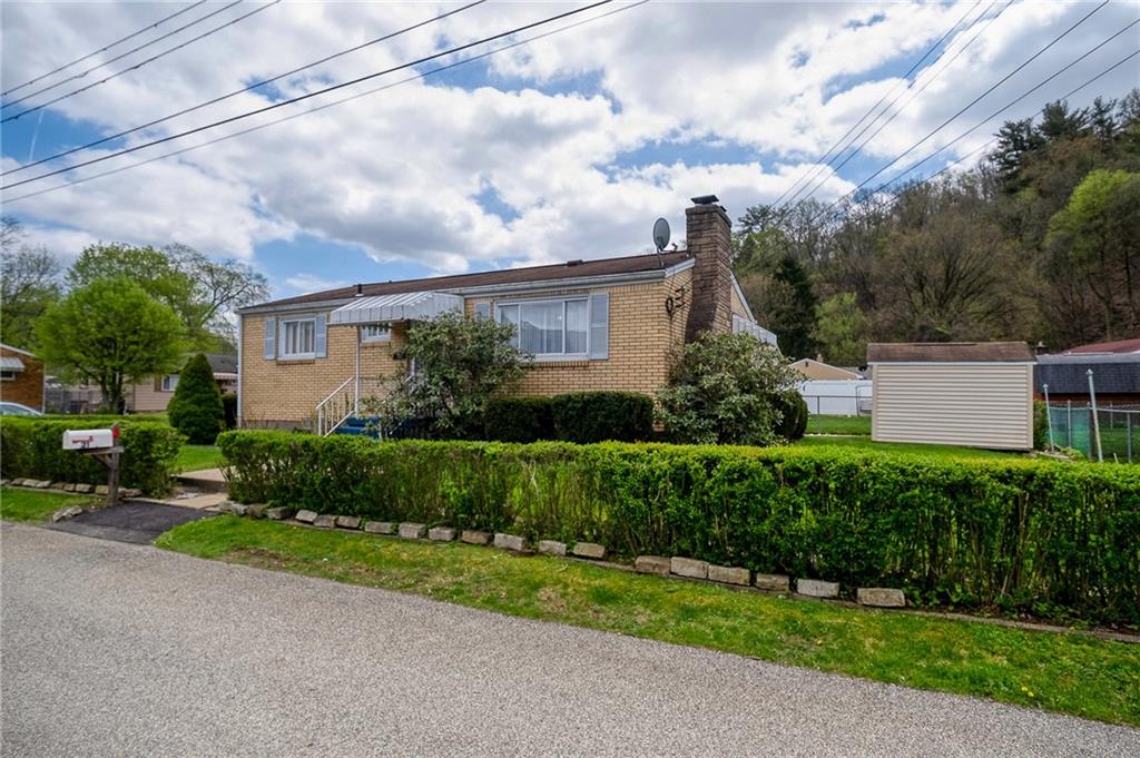 21 Spring Street Etna, PA 15223 - Photo 27 of 27 a view of a house with a yard and plants