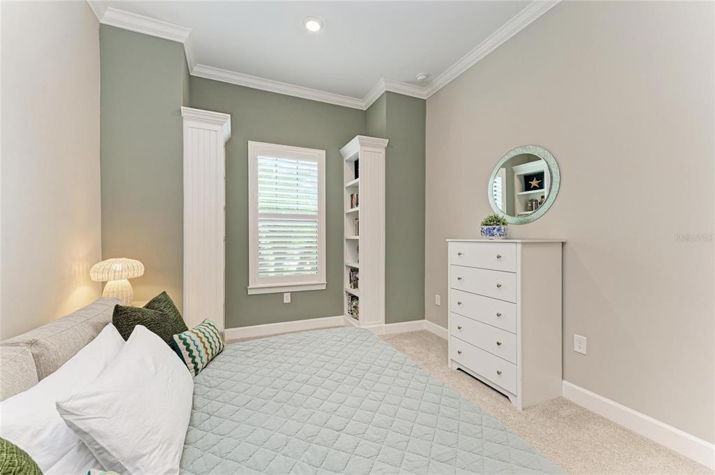 17631 Colebrook Circle Lakewood Ranch, FL 34202 - Photo 44 of 85 a bedroom with a bed and a dresser