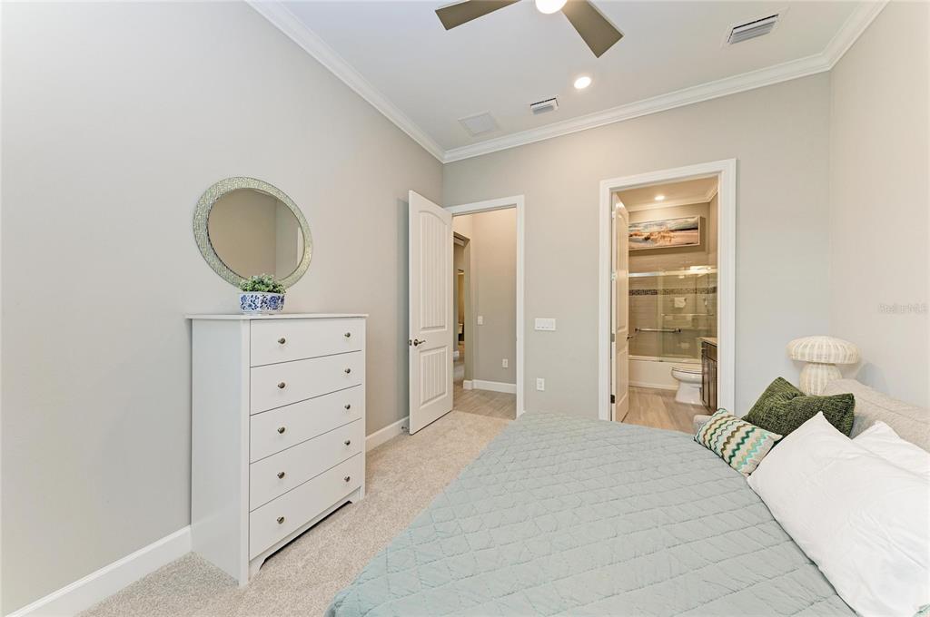 17631 Colebrook Circle Lakewood Ranch, FL 34202 - Photo 46 of 85 a bedroom with a bed and a cabinets