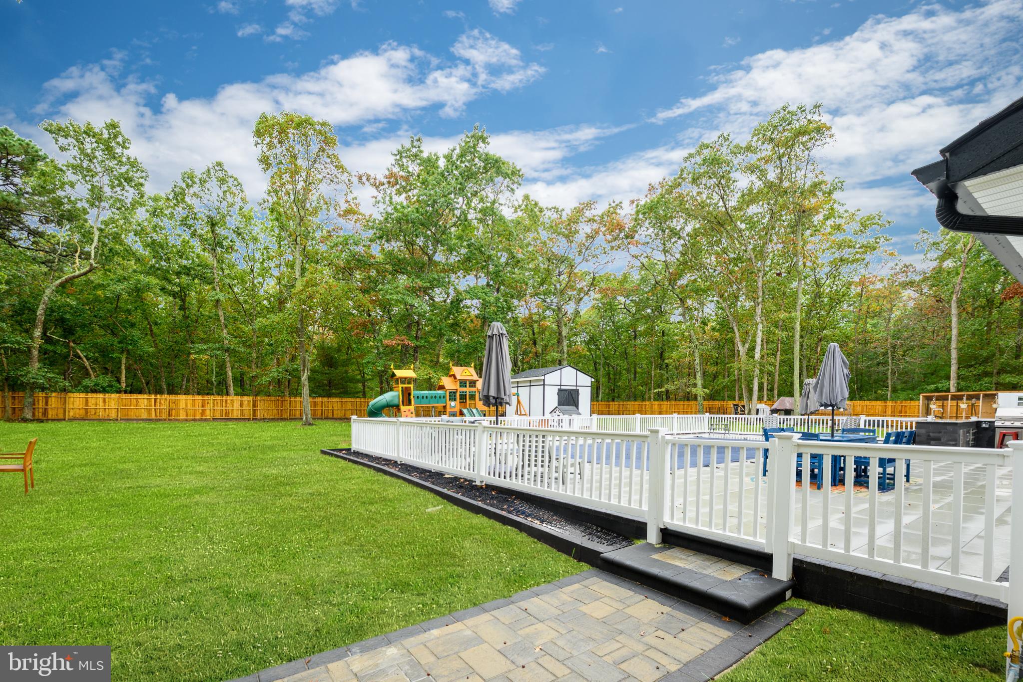 453 Stage Road Little Egg Harbor, NJ 08087 - Photo 11 of 54 Serene backyard oasis with lush greenery.