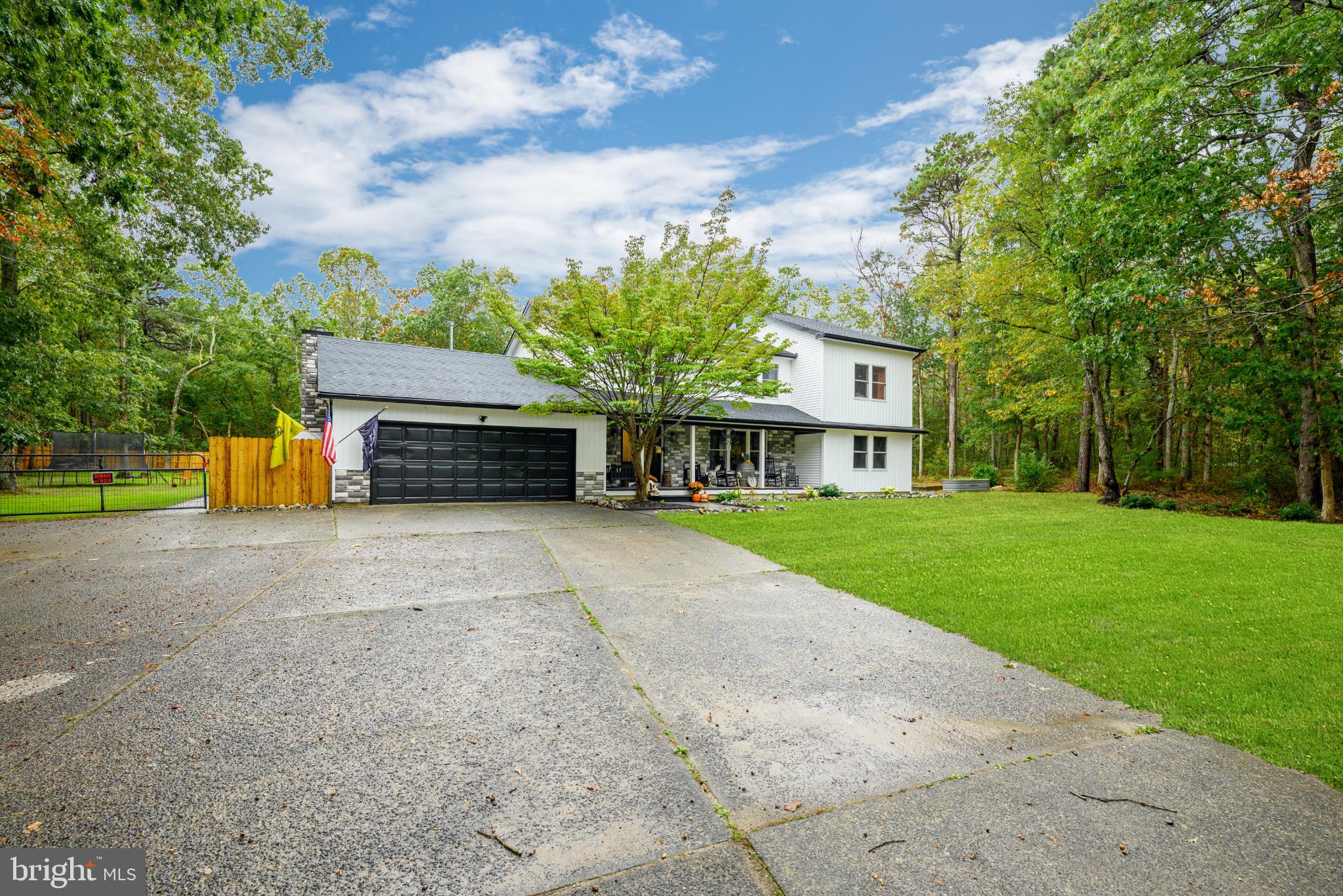 453 Stage Road Little Egg Harbor, NJ 08087 - Photo 3 of 54 Charming home nestled in lush greenery.