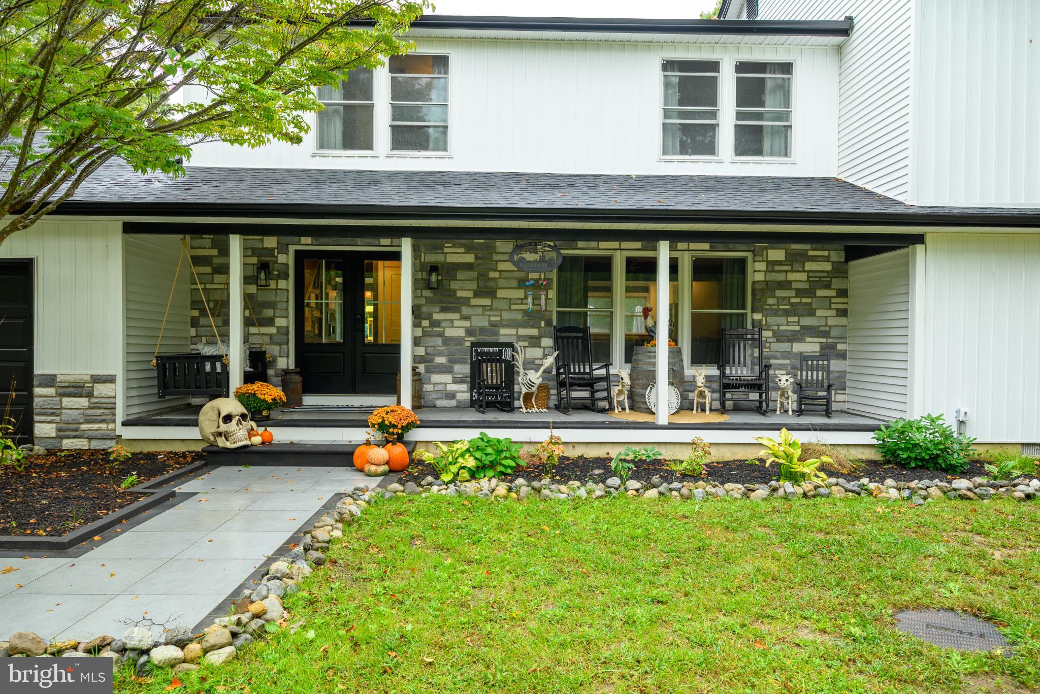 453 Stage Road Little Egg Harbor, NJ 08087 - Photo 4 of 54 Charming porch adorned for autumn's arrival.