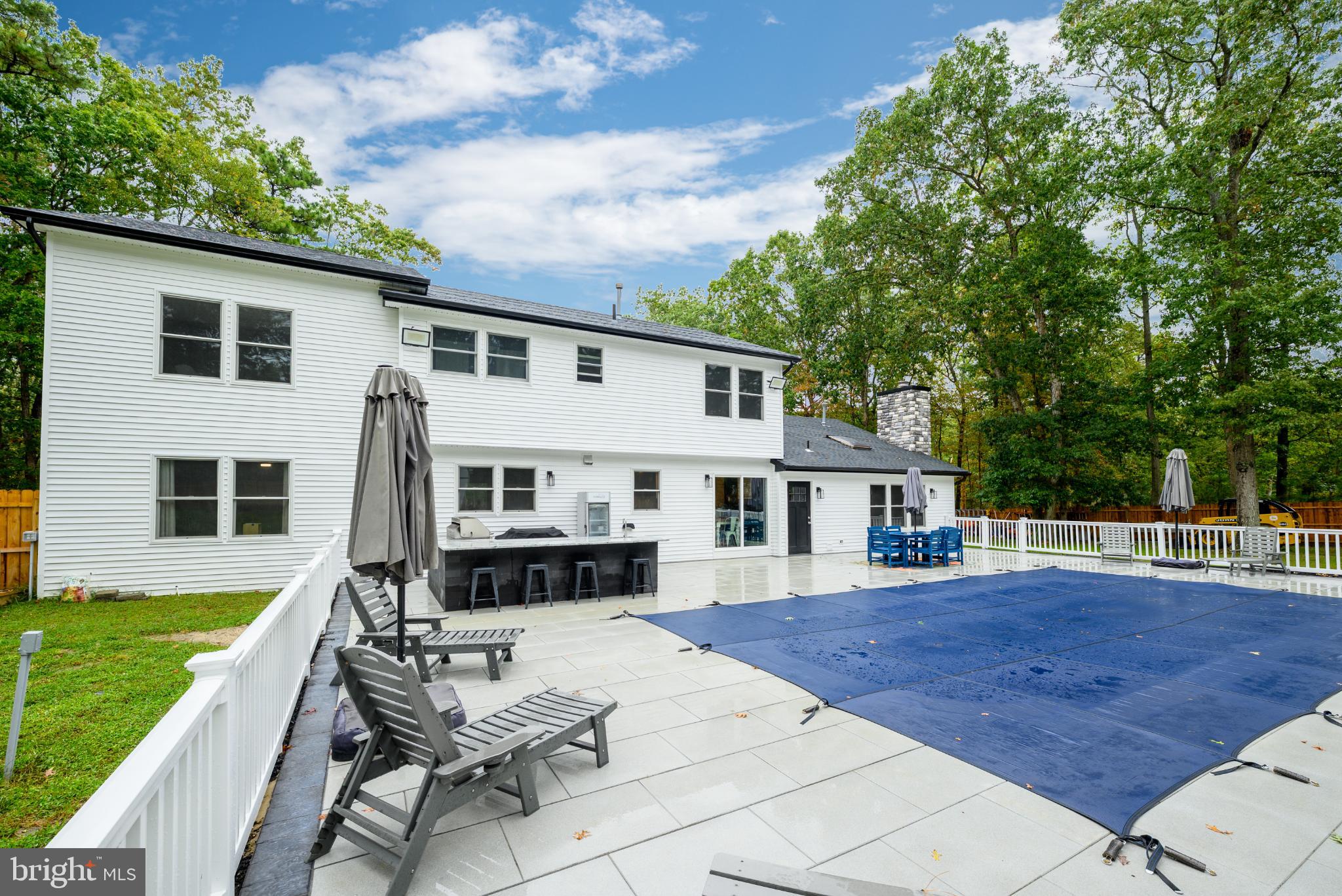 453 Stage Road Little Egg Harbor, NJ 08087 - Photo 10 of 54 Serene backyard oasis with pool and greenery.