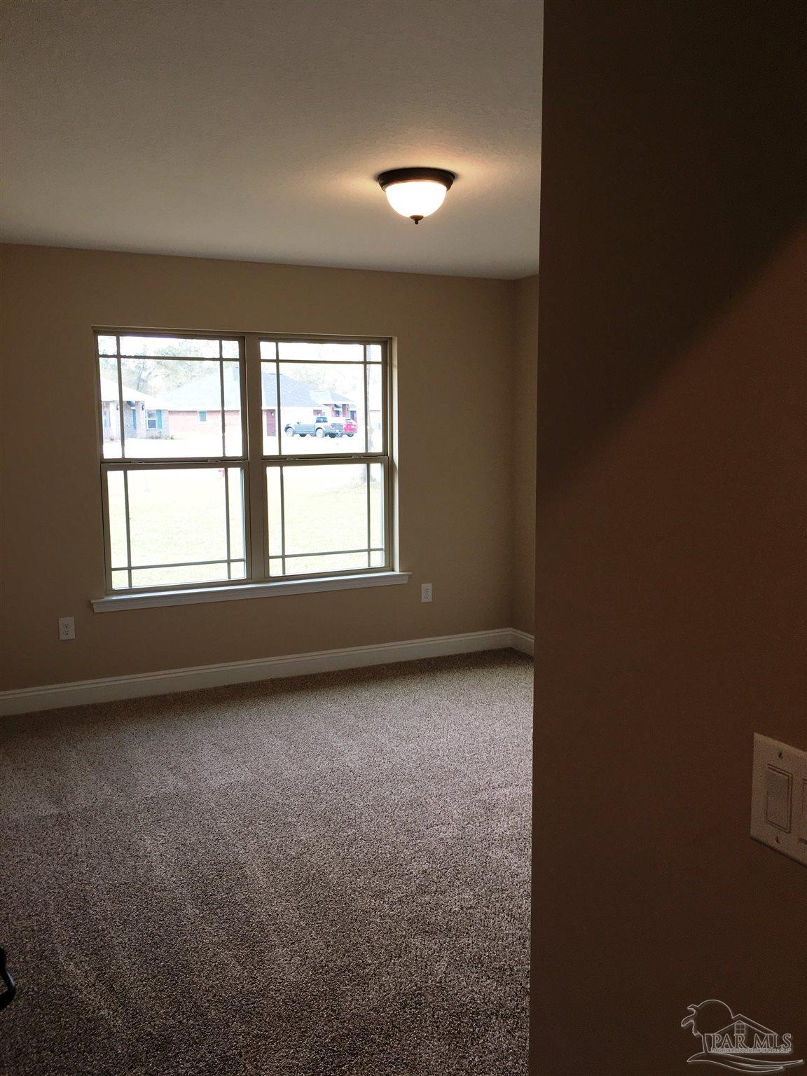 5480 South A Jones Road Milton, FL 32583 - Photo 15 of 35 Here's a view of the 2nd bedroom.