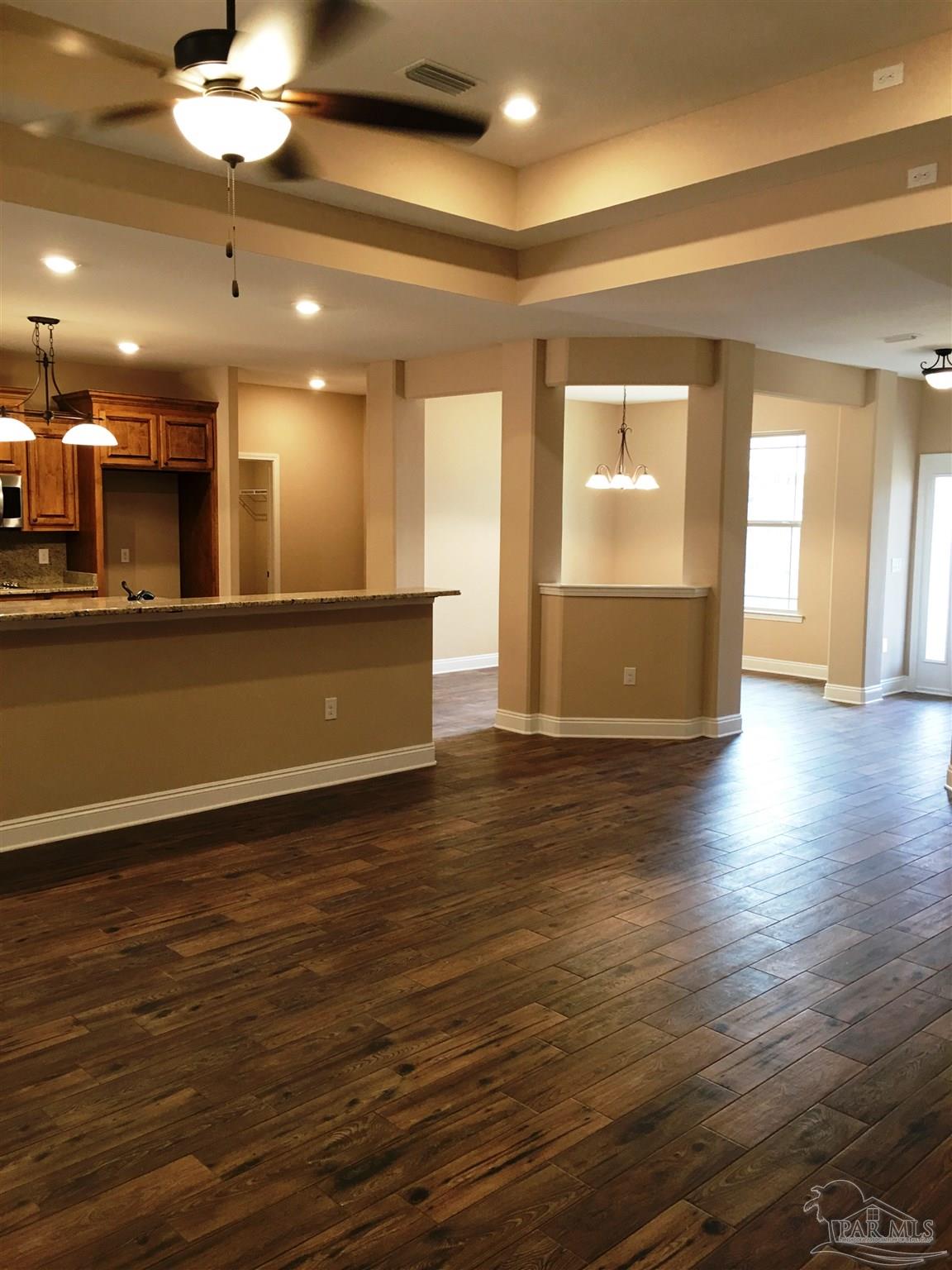5480 South A Jones Road Milton, FL 32583 - Photo 16 of 35 Here's a view from living room to dining room.
