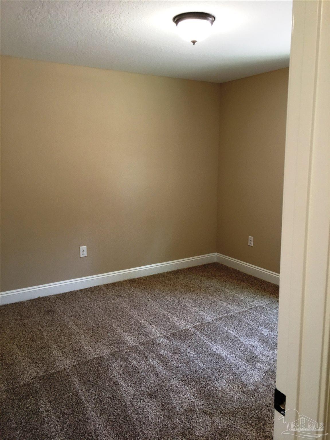 5480 South A Jones Road Milton, FL 32583 - Photo 17 of 35 A view of the 3rd bedroom is seen here.