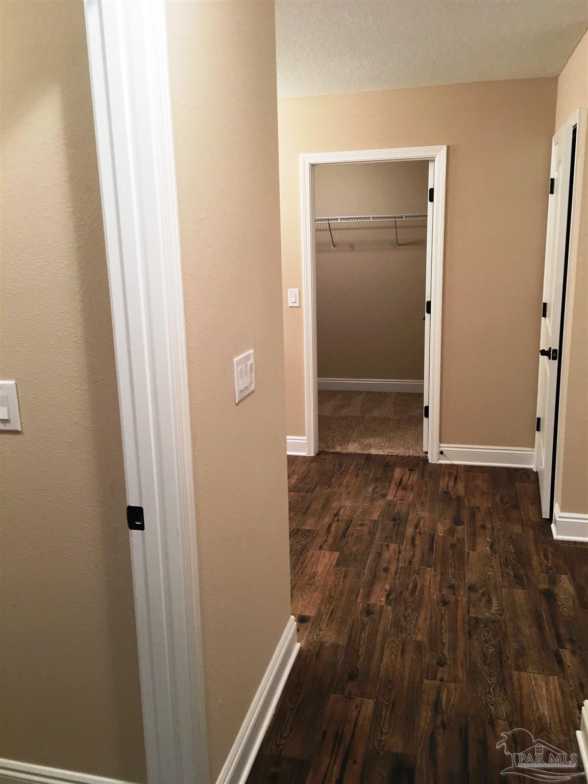 5480 South A Jones Road Milton, FL 32583 - Photo 26 of 35 Here's a view of the master bath entry.