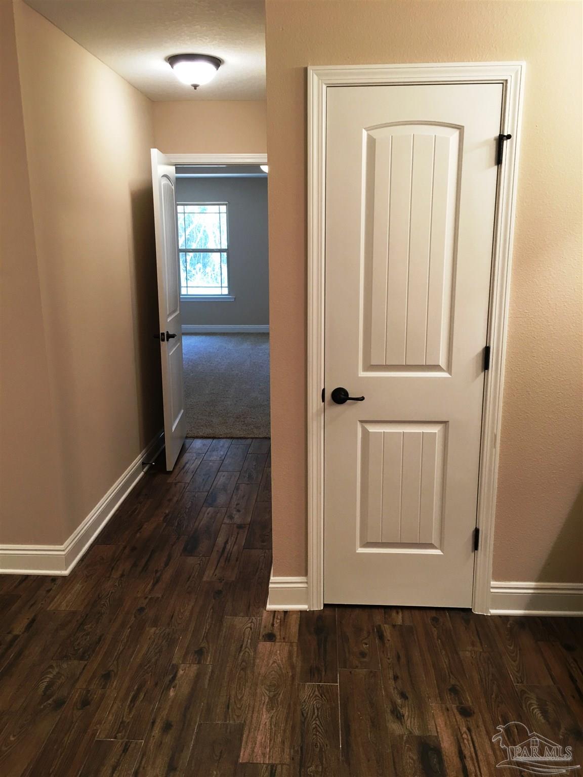 5480 South A Jones Road Milton, FL 32583 - Photo 31 of 35 A view within master bath toward its linen closet.