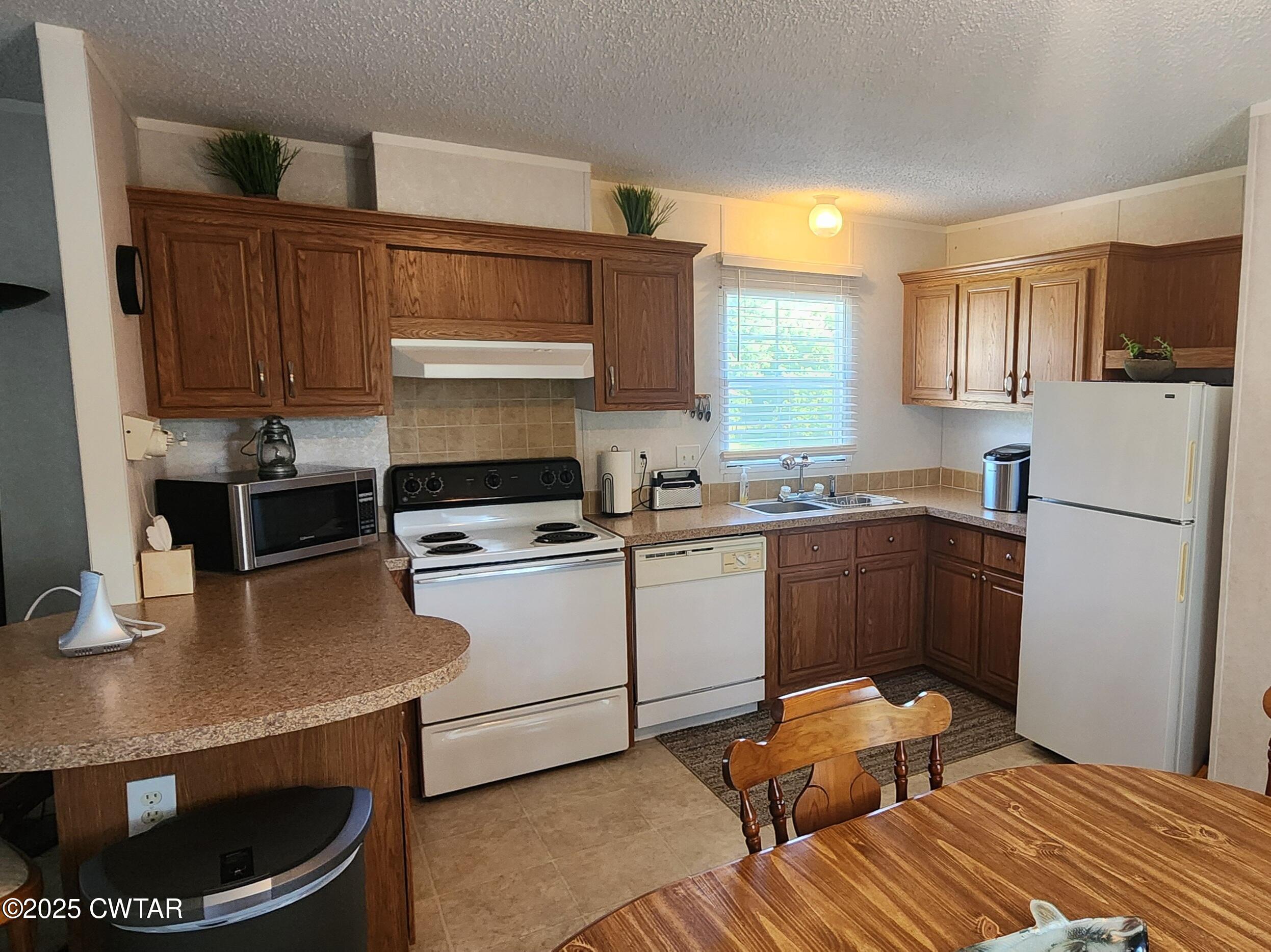 407 Pevahouse Camp Lane Decaturville, TN 38329 - Photo 14 of 44 kitchen 2