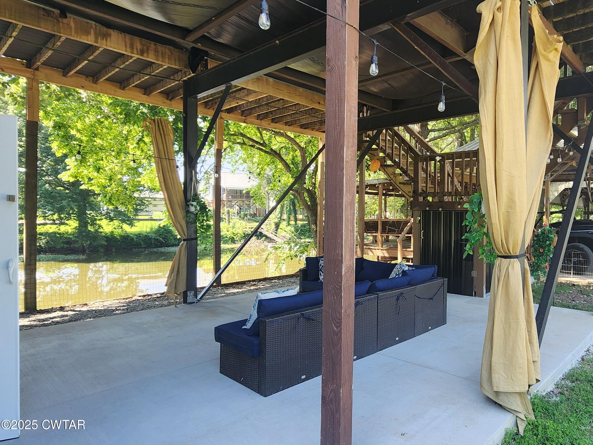 407 Pevahouse Camp Lane Decaturville, TN 38329 - Photo 29 of 44 sitting area under trailer