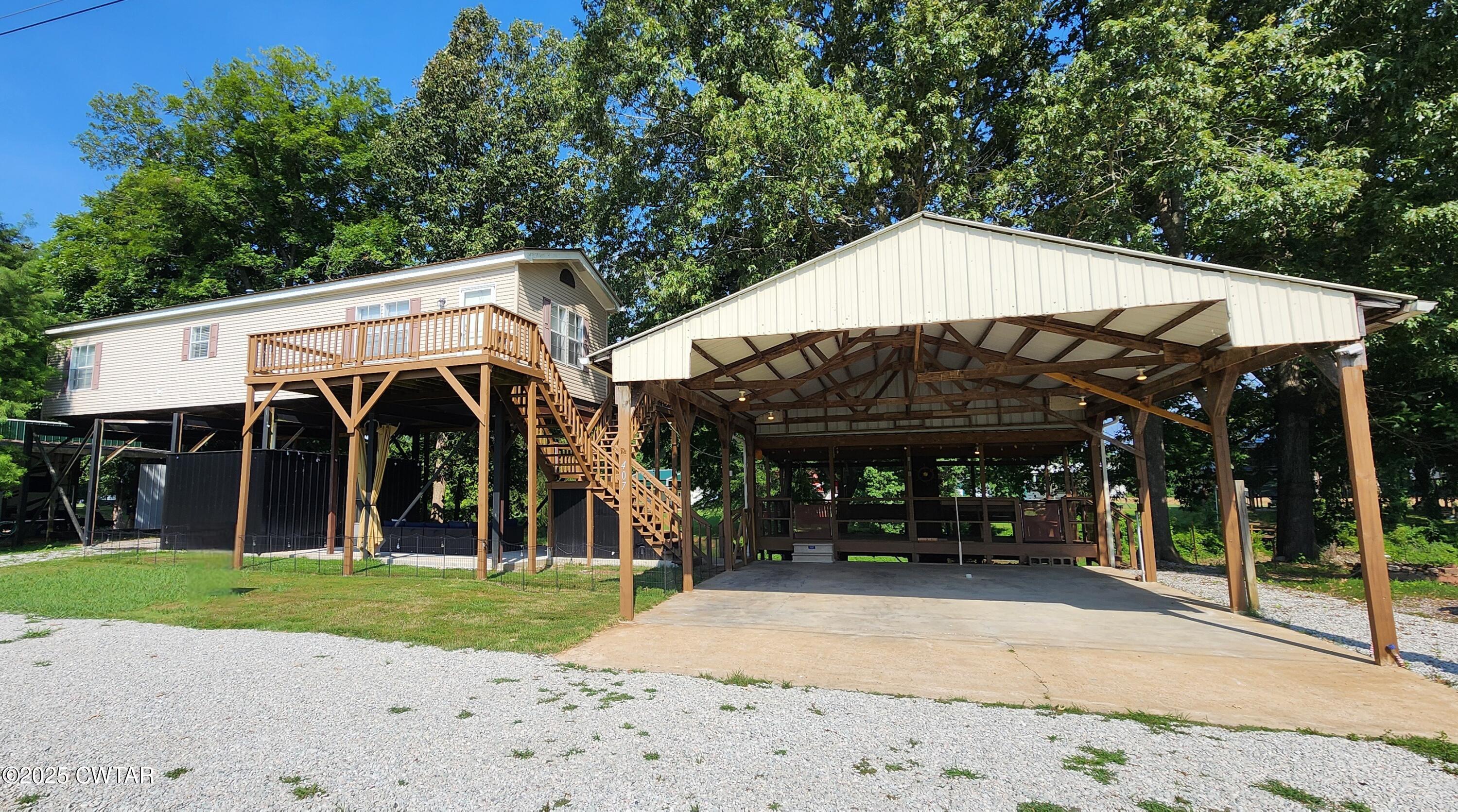 407 Pevahouse Camp Lane Decaturville, TN 38329 - Photo 38 of 44 side front