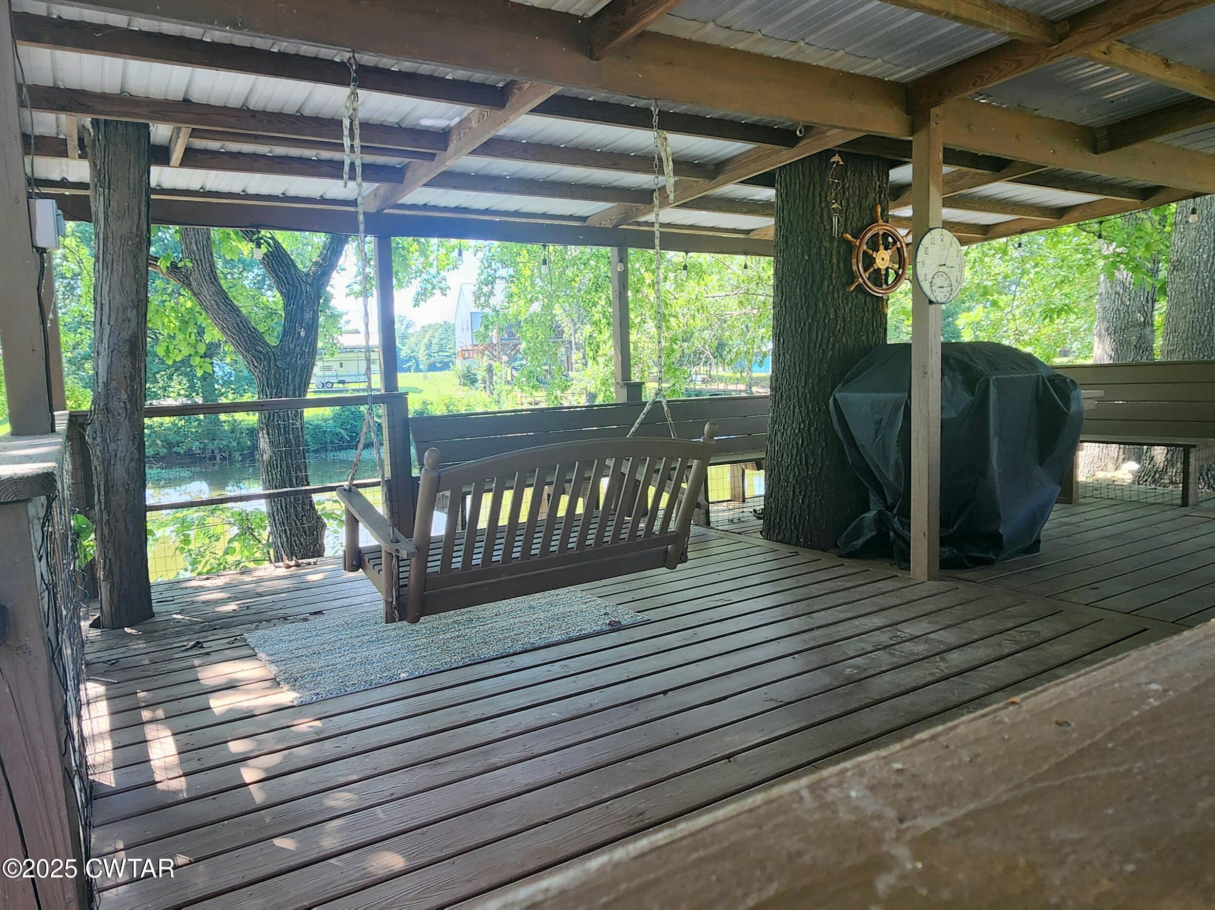 407 Pevahouse Camp Lane Decaturville, TN 38329 - Photo 39 of 44 deck porch