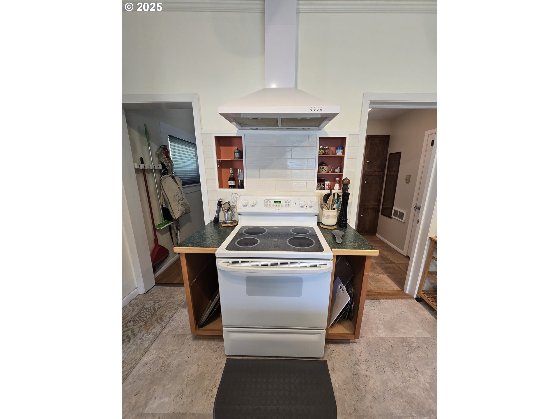 407 Residence Street Enterprise, OR 97828 - Photo 21 of 43 a stove top oven sitting inside of a kitchen