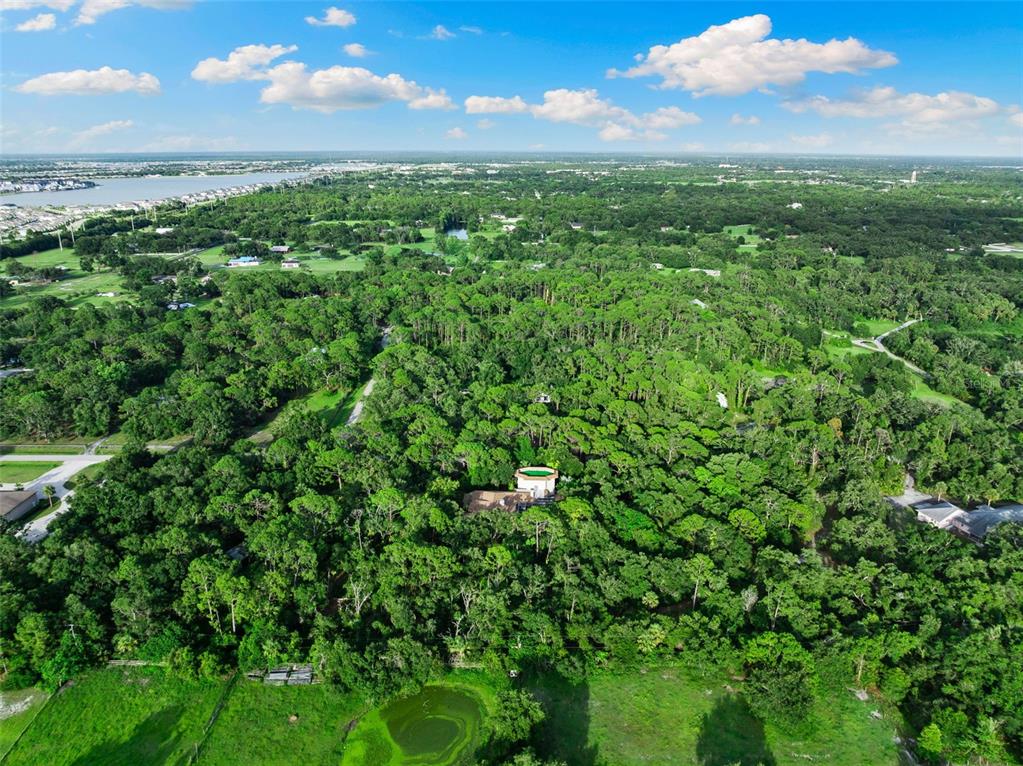 1343 Ranchero Drive Sarasota, FL 34240 - Photo 67 of 68 a view of a green field