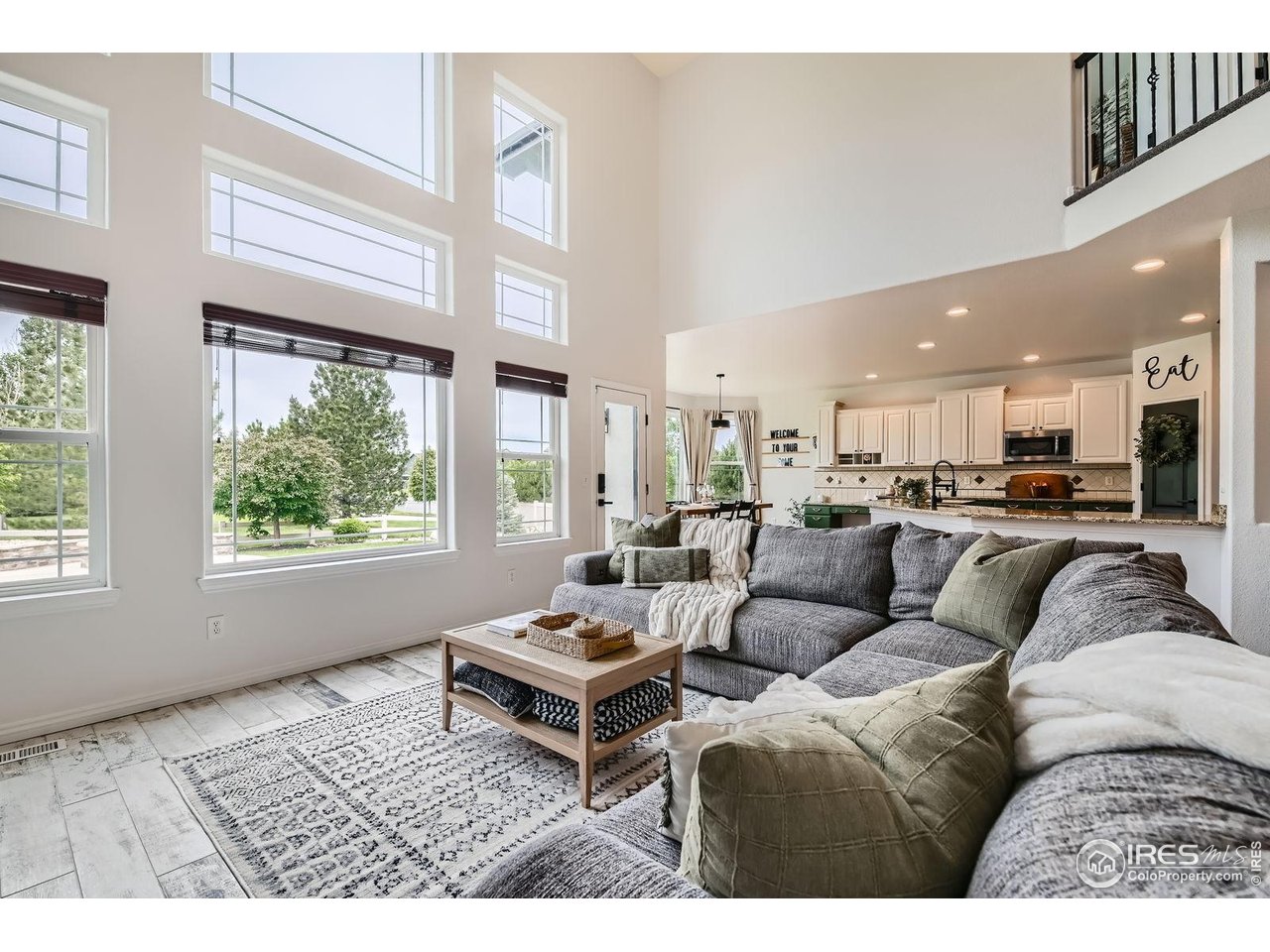 8839 Shetland Drive Frederick, CO 80504 - Photo 11 of 40 a living room with furniture and a large window