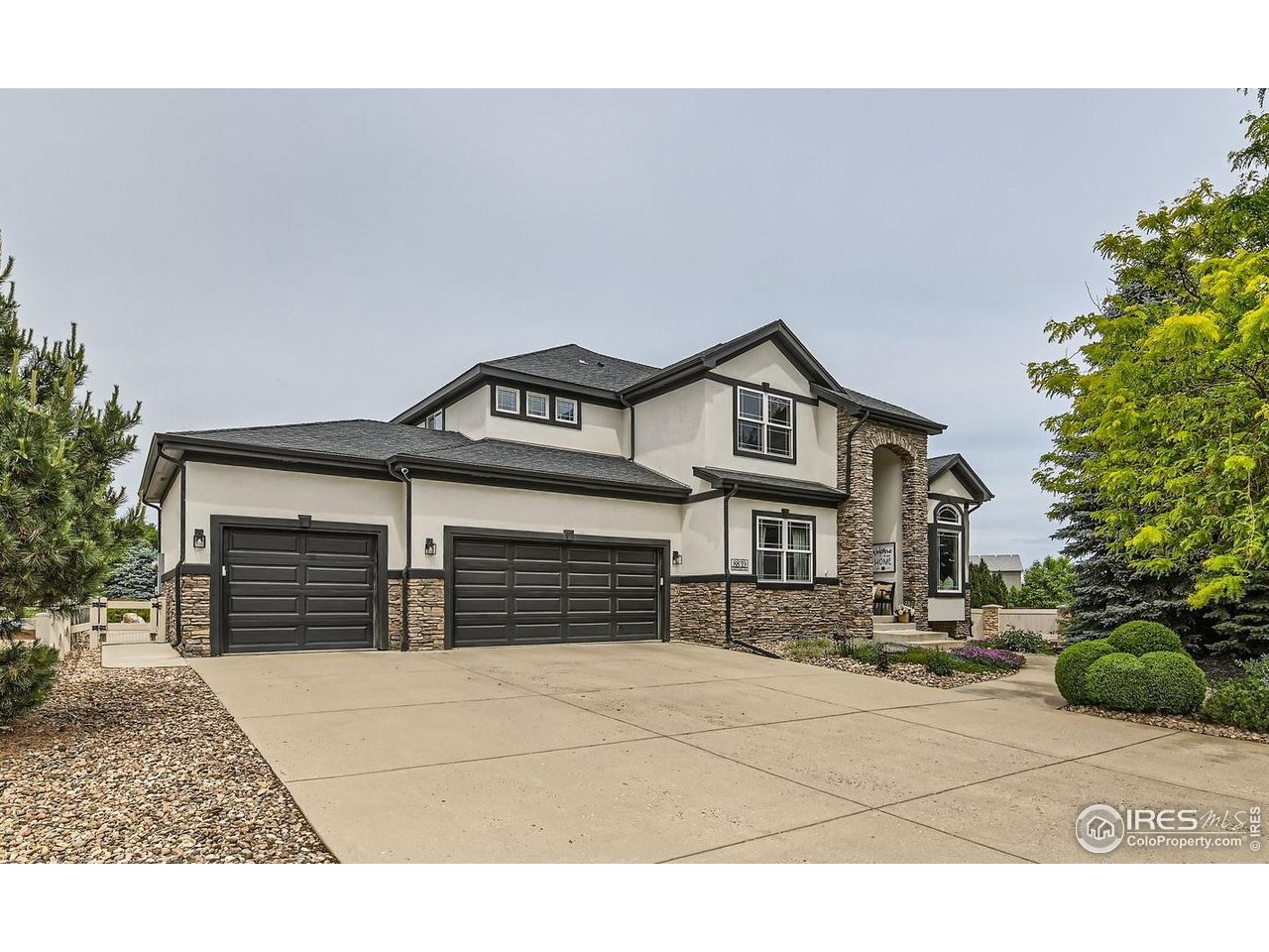 8839 Shetland Drive Frederick, CO 80504 - Photo 2 of 40 a house view with a outdoor space