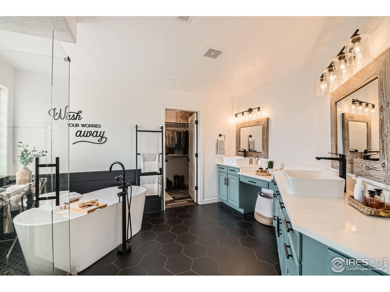 8839 Shetland Drive Frederick, CO 80504 - Photo 22 of 40 a living room with furniture and a flat screen tv
