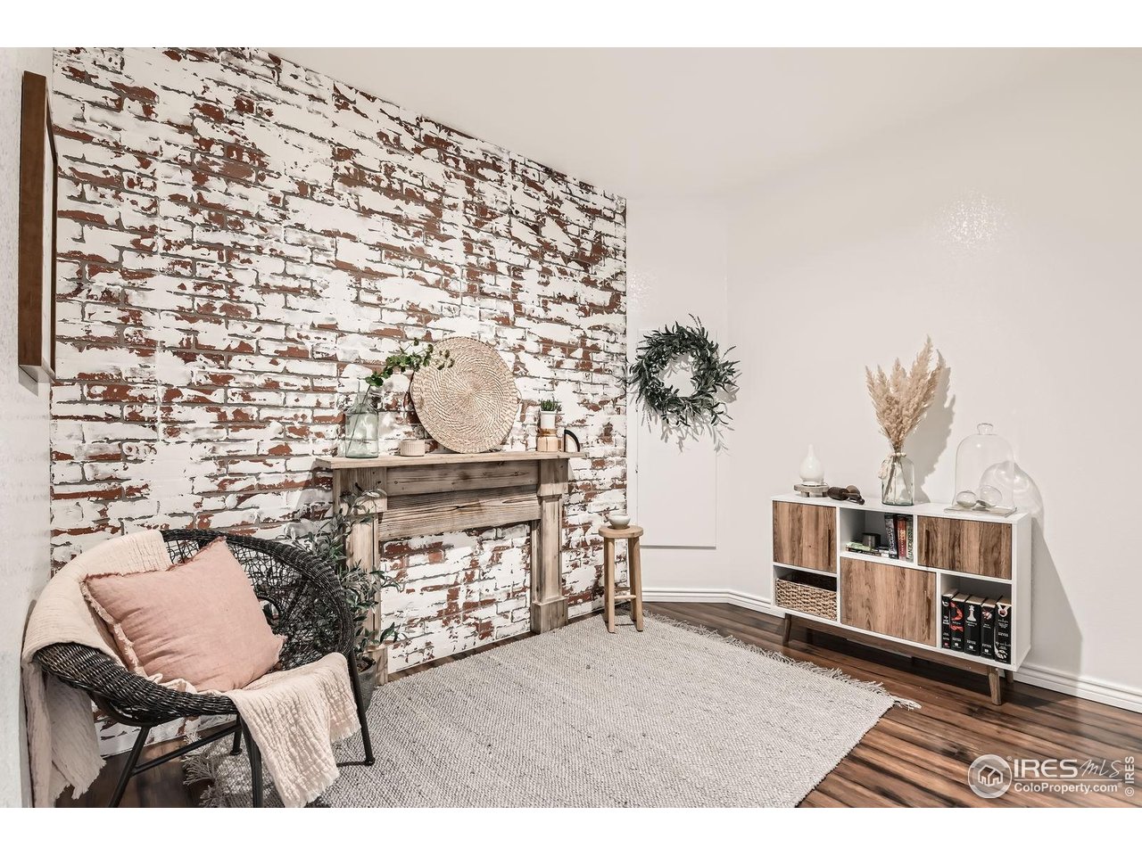 8839 Shetland Drive Frederick, CO 80504 - Photo 29 of 40 a living room with a couch and a table